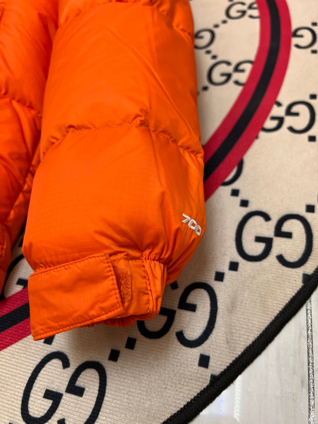 The North Face Orange and Black Colorblock Puffer Jacket