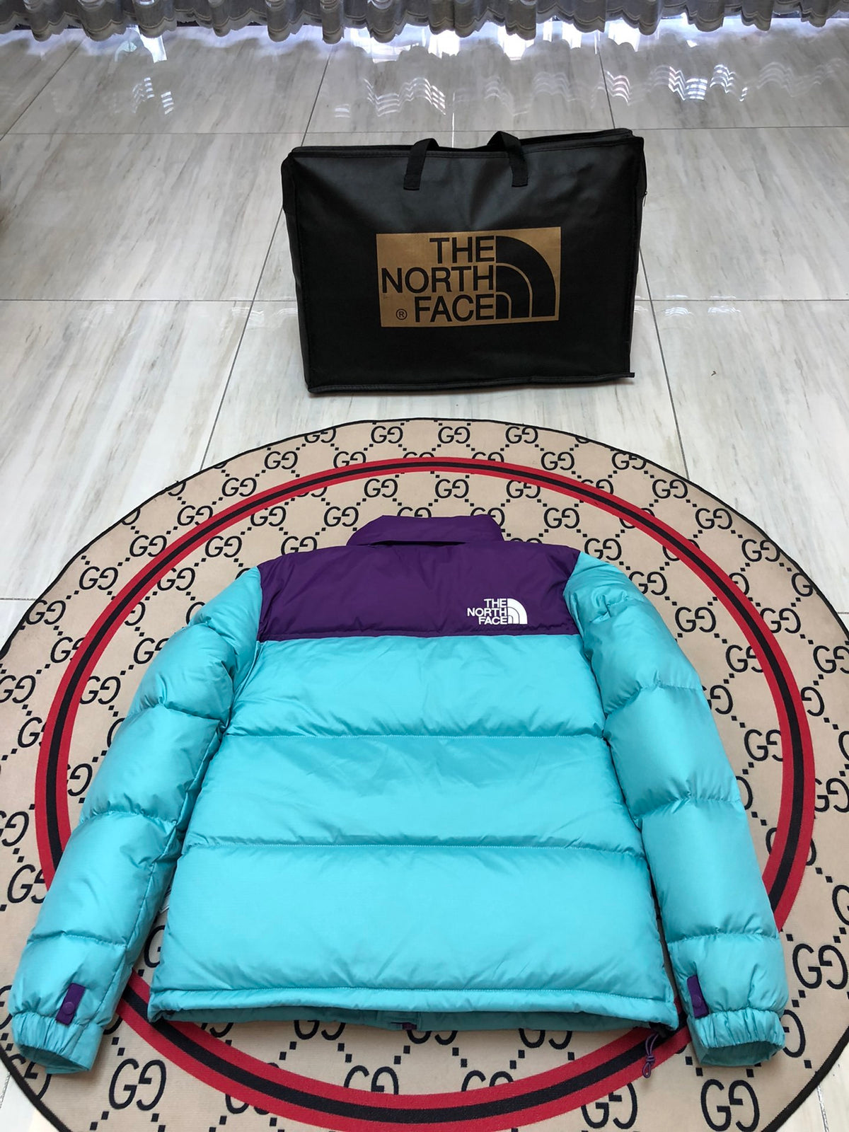 The North Face Turquoise Blue and Purple Colorblock Puffer Jacket