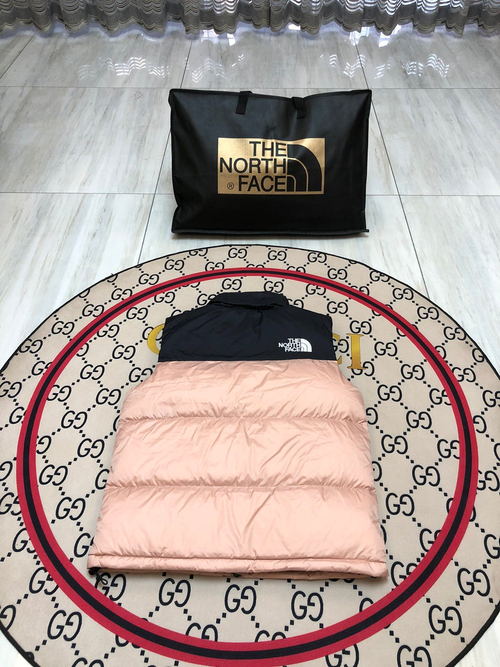 The North Face Blush Pink and Black Colorblock Puffer Vest